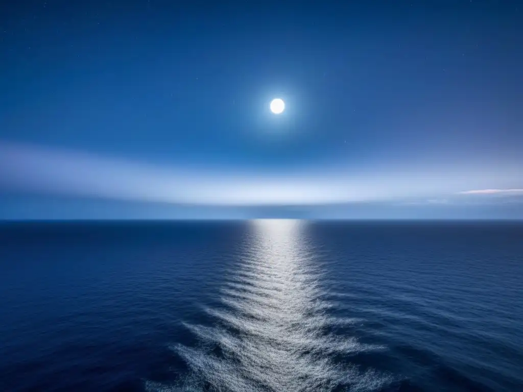 Fotografía nocturna en cruceros: Silueta de un crucero en el mar nocturno bajo un cielo estrellado y la luna brillante