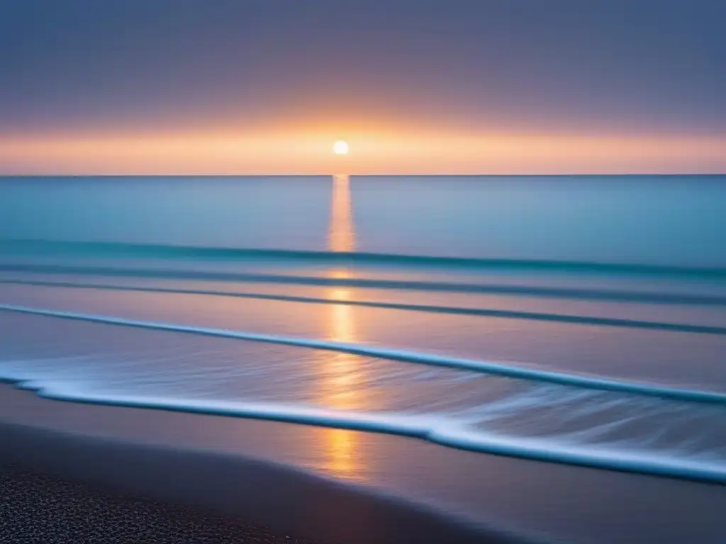 Un océano tranquilo al atardecer, reflejando los colores pastel del sol