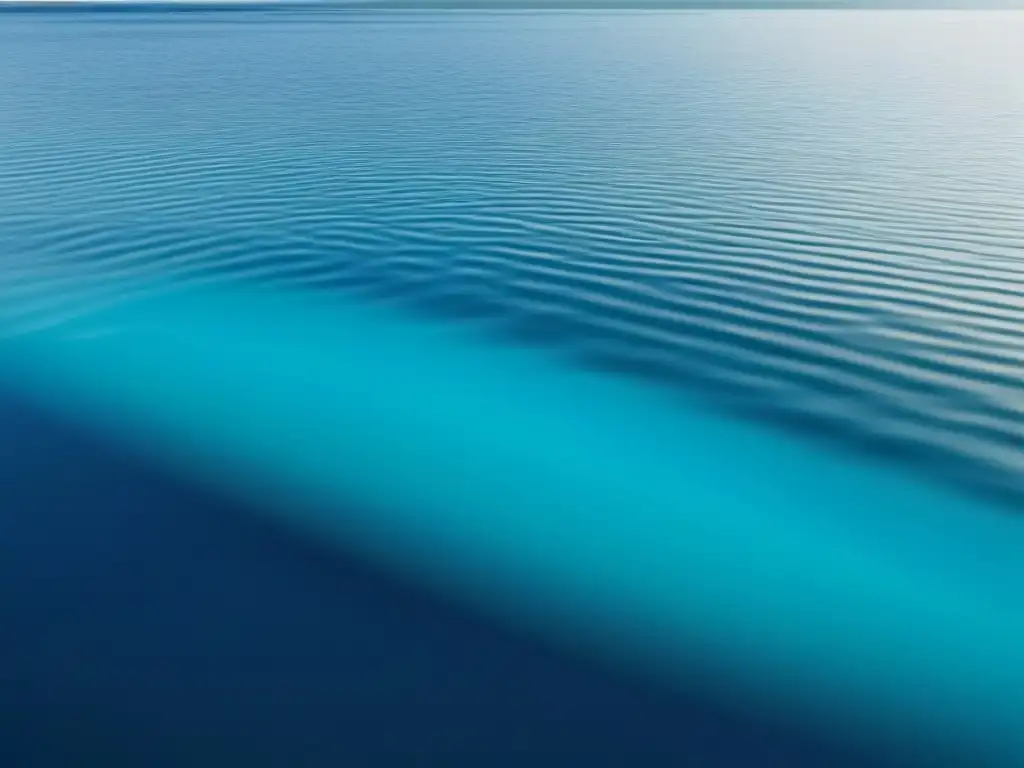 Un paisaje marino cautivador con variaciones de color en el agua del mar, de índigo a turquesa, reflejando la luz del sol