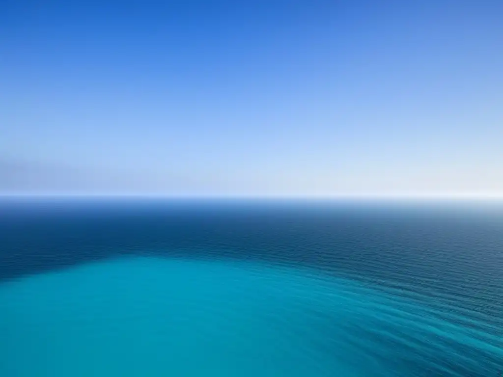 Un paisaje sereno y minimalista de un vasto océano, aguas turquesas cristalinas bajo un cielo azul sin nubes